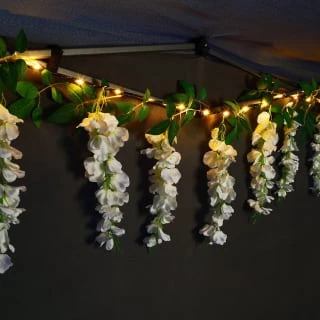 Solar Powered 180cm Artificial Leaf Garland With Wisteria Flowers - Warm White 3 Solar Powered 180cm Artificial Leaf Garland With Wisteria Flowers - Warm White