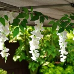 Solar Powered 180cm Artificial Leaf Garland With Wisteria Flowers - Warm White 9 Solar Powered 180cm Artificial Leaf Garland With Wisteria Flowers - Warm White -Addis Homedecor Store 379258 180cm solar powered artificial leaf garland with wisteria flowers 20 warm white micro leds